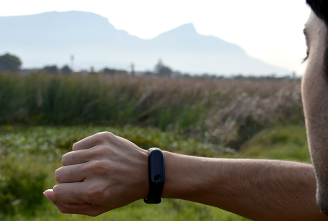 Smart watch fitness tracker with Table Mountain, Cape Town in background